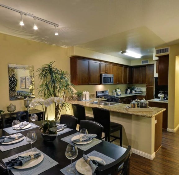 Model Kitchen with Dining Area at Rosina Vista in Chula Vista, CA