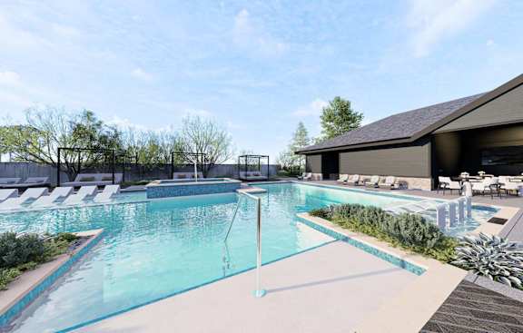 A large outdoor swimming pool with a glass barrier dividing it into two sections. at Stack at Wheat Ridge Apartments, Apartments, Wheat Ridge, CO