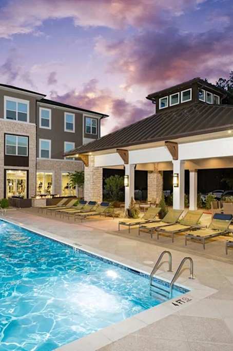 Pool Side Relaxing Area at The Flats at Ballantyne Apartments, Charlotte, 28277