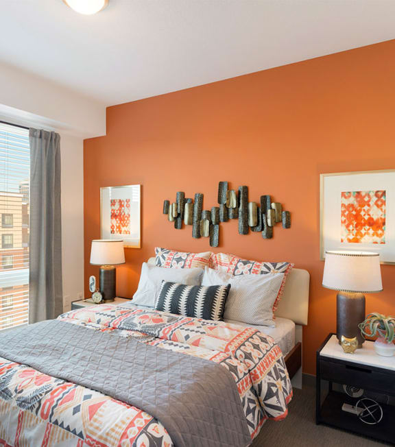 bedroom with bed and large window