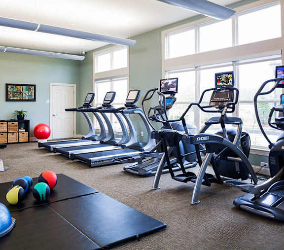 fitness room at The Commons Weymouth during a sunny day