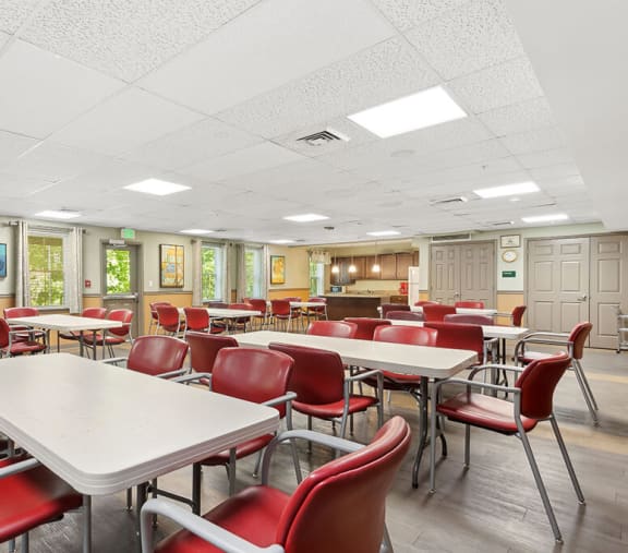 Community lounge and kitchen at Fairbrooke Senior Apartments in Aberdeen MD