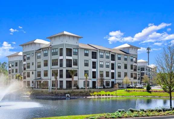 Exterior view of Longleaf Apartments in St. Johns, FL, with scenic surroundings.