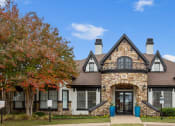 Thumbnail 27 of 27 - Villas of Vista Ridge Leasing Center, surrounded by trees