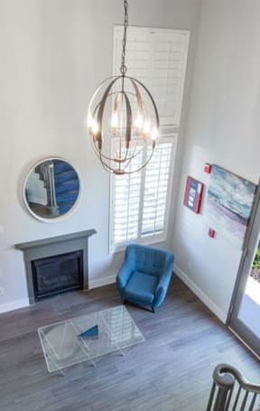a view of a living room from the top of a staircase at Warner Center Townhomes, California, 91303