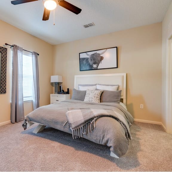 a large fitness room with treadmills and other exercise equipment at Magnolia Village Apartments, Jacksonville, FL, 32207