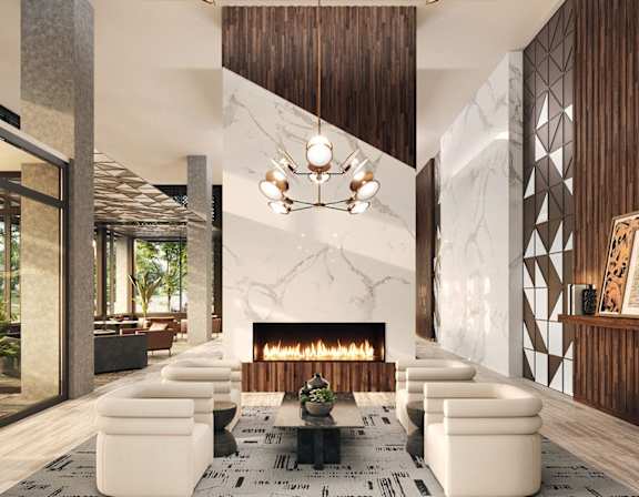 A modern living room with a fireplace and a large window.