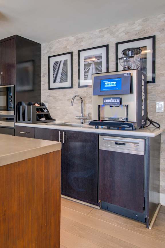 Coffee machine in business and living lounge at Towers at Rincon, San Francisco, 94105