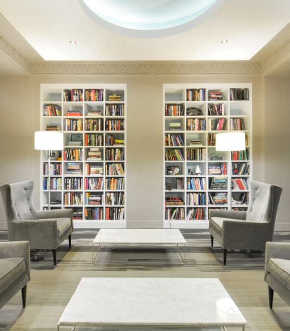 a large library with a lot of books at 1841 Columbia Road Apartments, Washington, Washington DC
