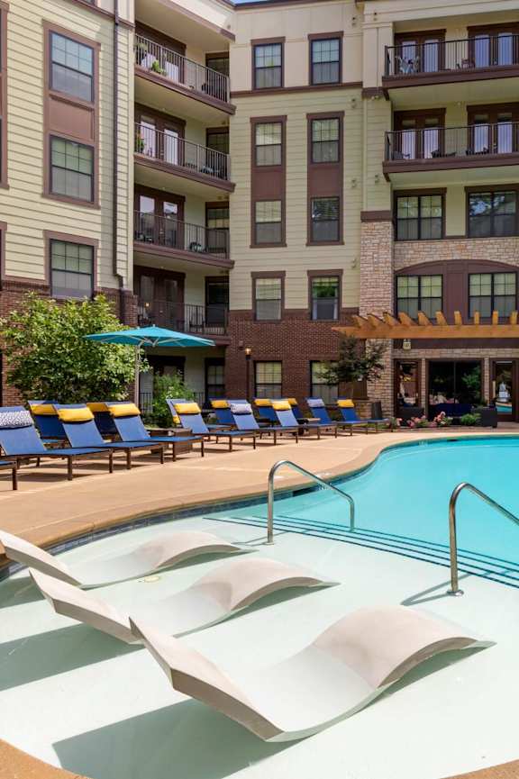 the swimming pool at the residence at dusk at 1010 Dilworth Apartments, Charlotte, North Carolina