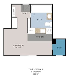 A floor plan of a home with a living room, kitchen, bathroom, and entry.