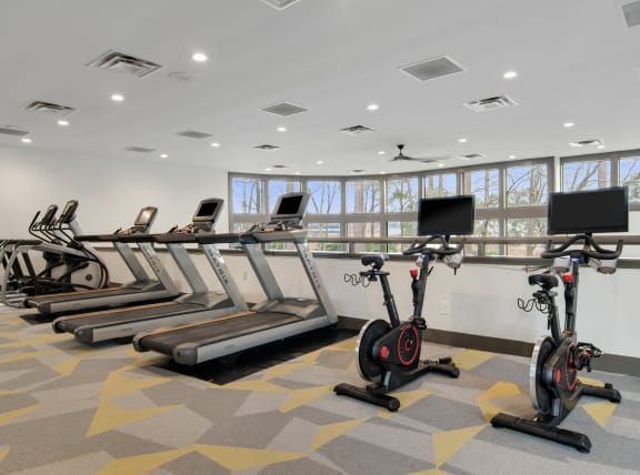Gym with Exercise Machines at Duluth, GA Apartments for Rent Near Shorty Howell Park