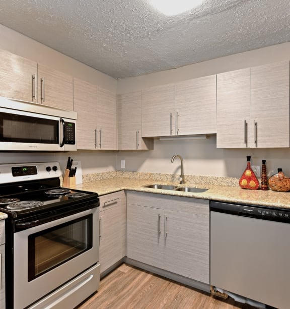 A newly renovated kitchen with stainless steel appliances at Heritage Hill Estates Apartments, Cincinnati, Ohio 45227