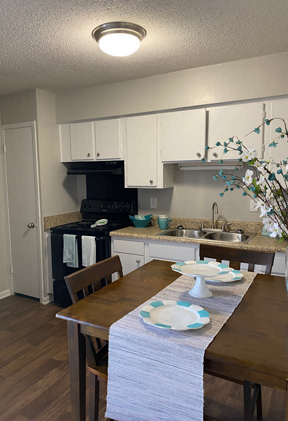 A small, cozy kitchen with a microwave and a dishwasher.