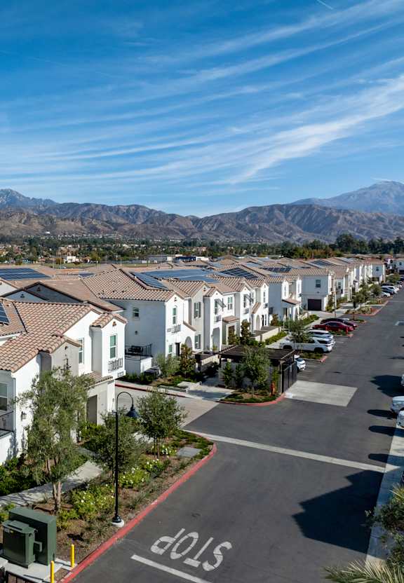 Large Buildings View at San Carlo Townhomes, Highland, CA 92346