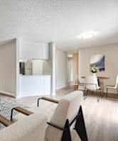 A room with wooden floors and a sliding glass door.at The Dawson, Rocky Mount, NC
