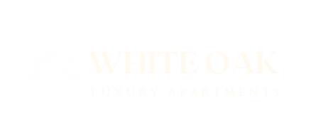 a white oak luxury apartments logo on a black background