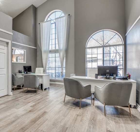 a living room with couches and a coffee table
