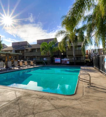Poolside Sundeck With Relaxing Chairs at Highlander Park Apts, Riverside, California