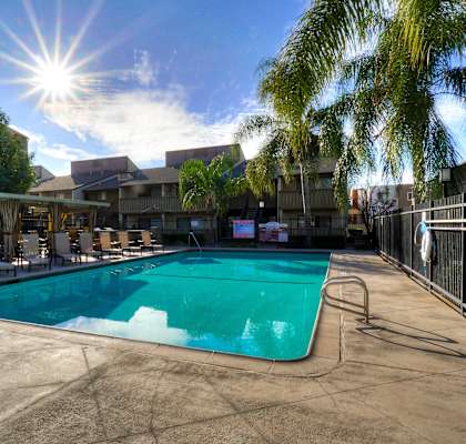 Poolside Sundeck With Relaxing Chairs at Highlander Park Apts, Riverside, California