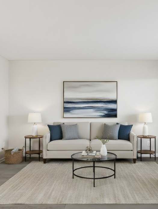 a large living room with a kitchen and a dining room