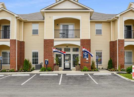 Exterior View Of Austin Place Apartments' Clubhouse Entrance