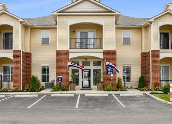 Exterior View Of Austin Place Apartments' Clubhouse Entrance