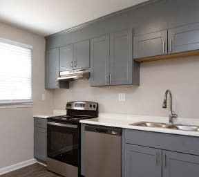 the preserve at ballantyne commons apartment kitchen with stainless steel appliances at The Groves, North Carolina