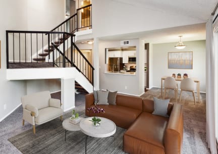 a living room with a couch and a table