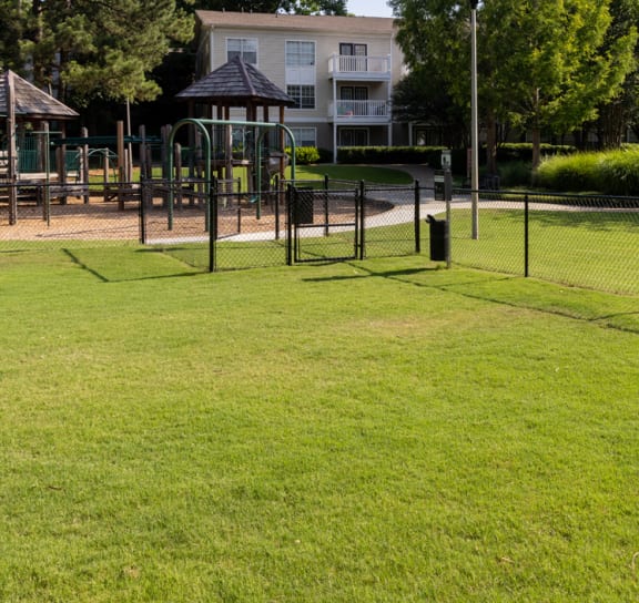 a park with a playground and a gazebo