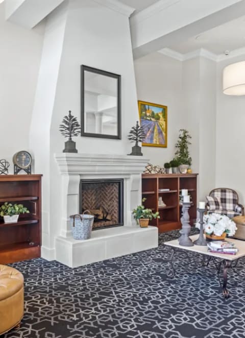 a living room filled with furniture and a fireplace at Cypress Creek at River Oaks, Texas, 75165