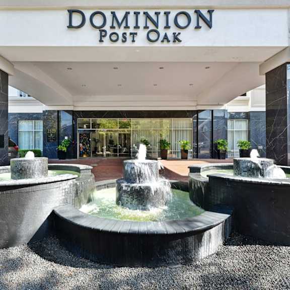 entrance with a fountain in front of it at Dominion Post Oak in Houston, TX