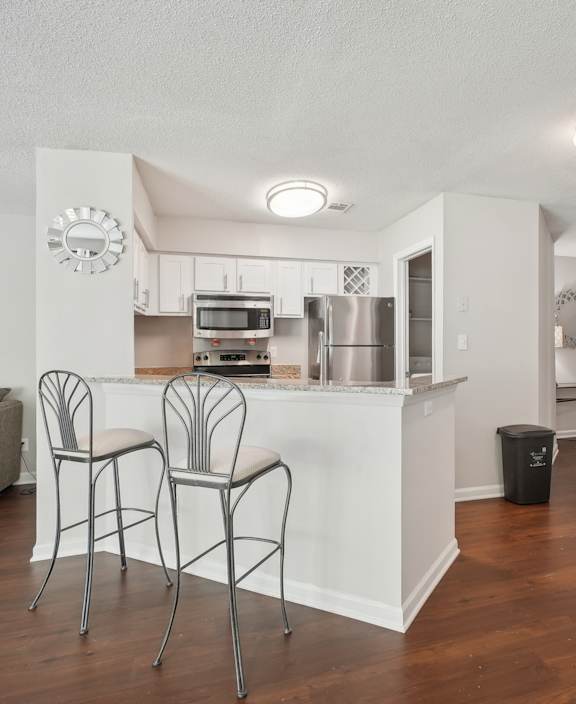 our apartments offer a modern kitchen with stainless steel appliances at University Ridge Apartments, Durham, North Carolina, 27707