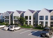 Thumbnail 4 of 18 - A row of houses with cars parked in front at Westwood Meadows, Westlake, OH, 44145