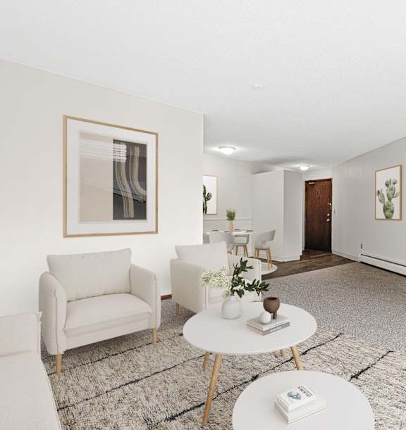 A living room with a white couch, a white coffee table, and a white rug.