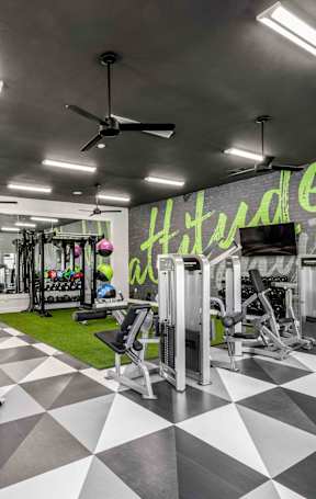 A gym with a black and white checkered floor.