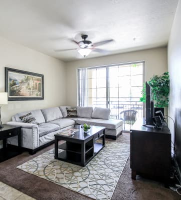 a living room with a couch and a tv