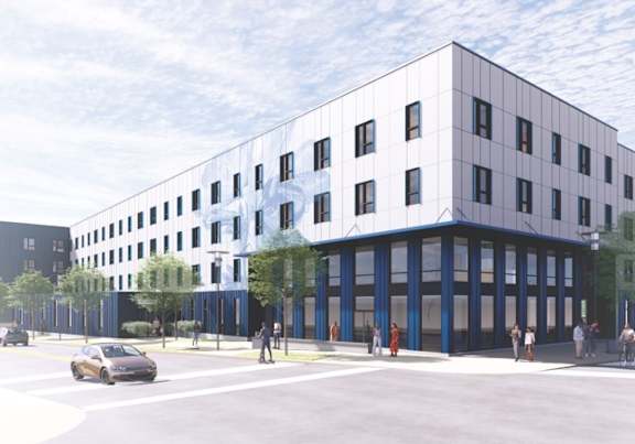 A modern building with a blue and white facade is depicted in the image.