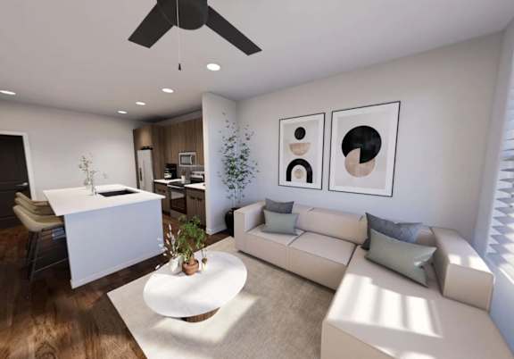 A modern living room with a white couch, a coffee table, and a ceiling fan. at Stack at Wheat Ridge Apartments, Apartments, Wheat Ridge, CO