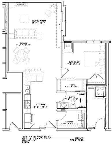 Floor Plan  A floor plan of a house with a kitchen, living room, and two bedrooms.