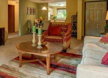 Living room at Chambers Creek Estates in University Place, WA 98467