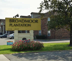 a sign reading "broadmoor plantation"