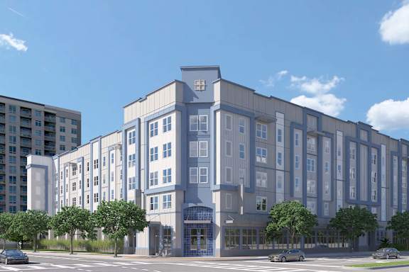 an architectural rendering of a large building with a parking lot and trees
