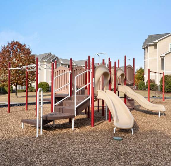 A spacious gym with a variety of equipment including weights and cardio machines. at Stone Gate Apartments, Spring Lake, 28390