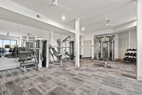 a fitness center with treadmills and other exercise equipment