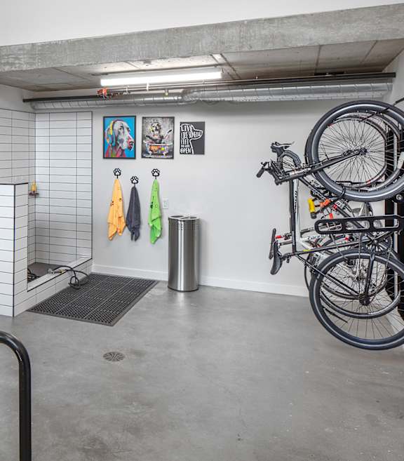 A bike rack with bikes on it in a room.