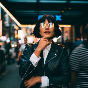 Woman Wearing Glasses Admiring City