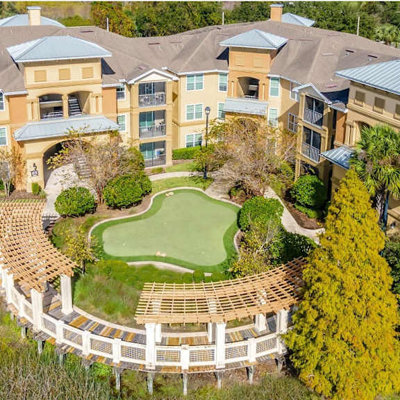 A poolside image advertising a $300 off first month offer on select apartment homes.