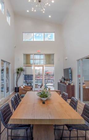 a large dining room with a wooden table and chairs at Inspiration Apartments, Cottonwood, AZ