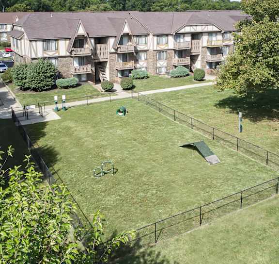 a dog park with agility equipment at The Timbers Apartments, Evansville, IN